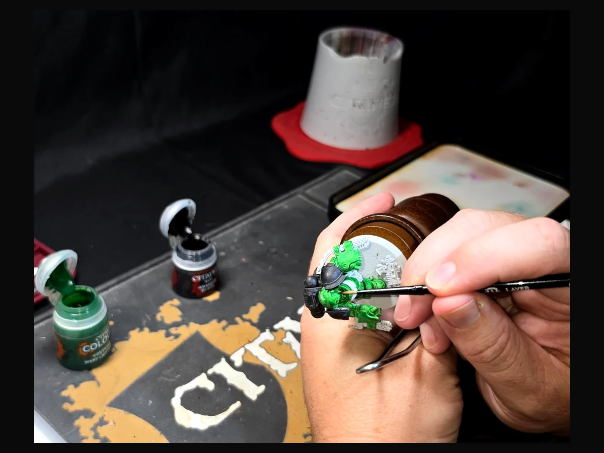 Close-up of miniature painting in progress.